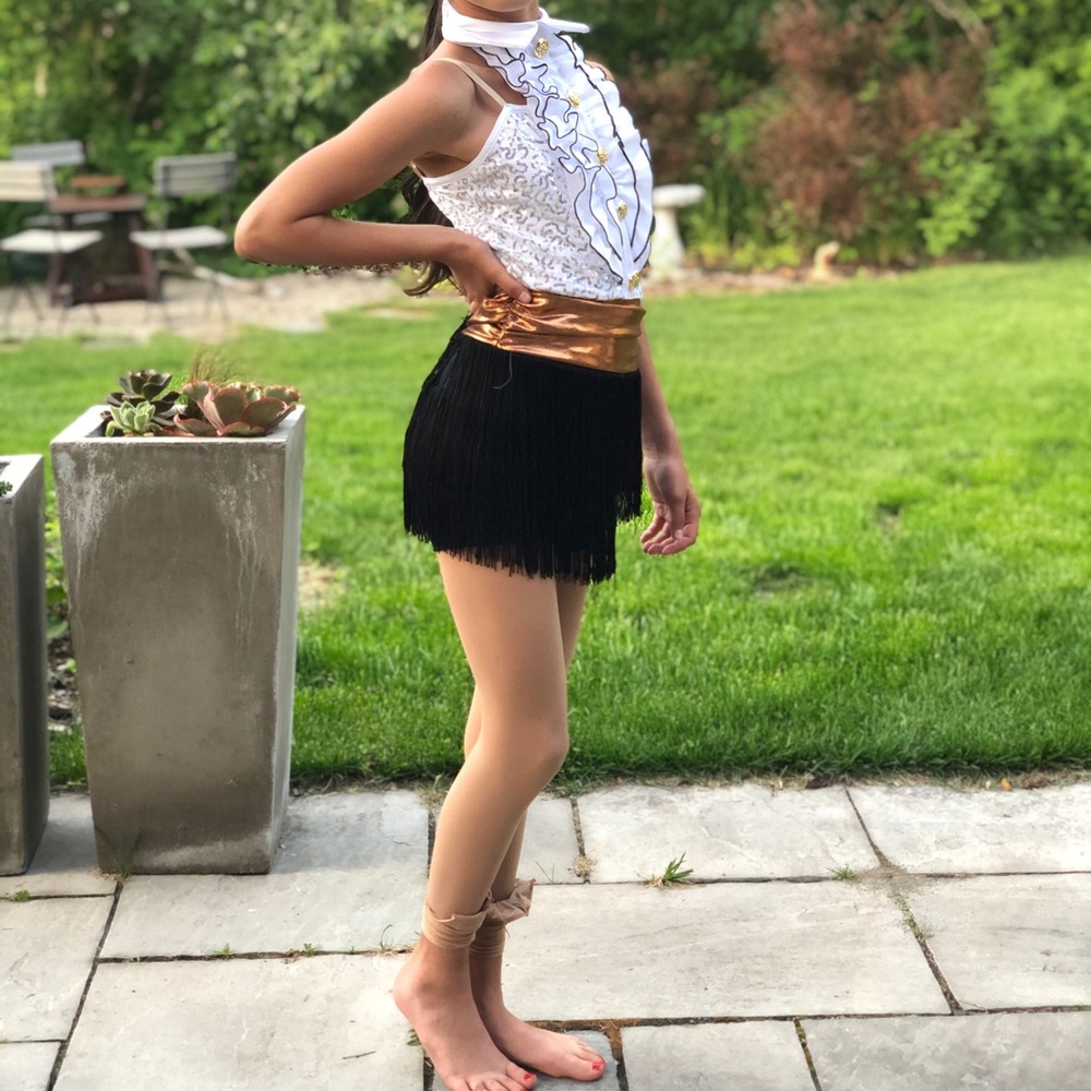 White and Black Dance Costume with Gold Accents